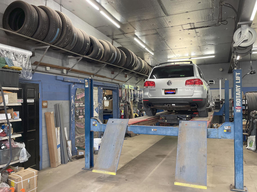 Tire and alignment service being performed in our garage